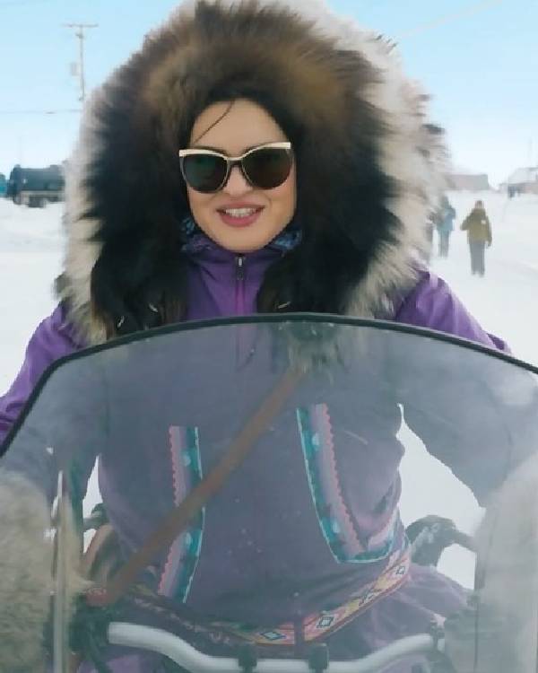 Anna Lambe North of North Season 2 Purple Hooded Parka - side view
